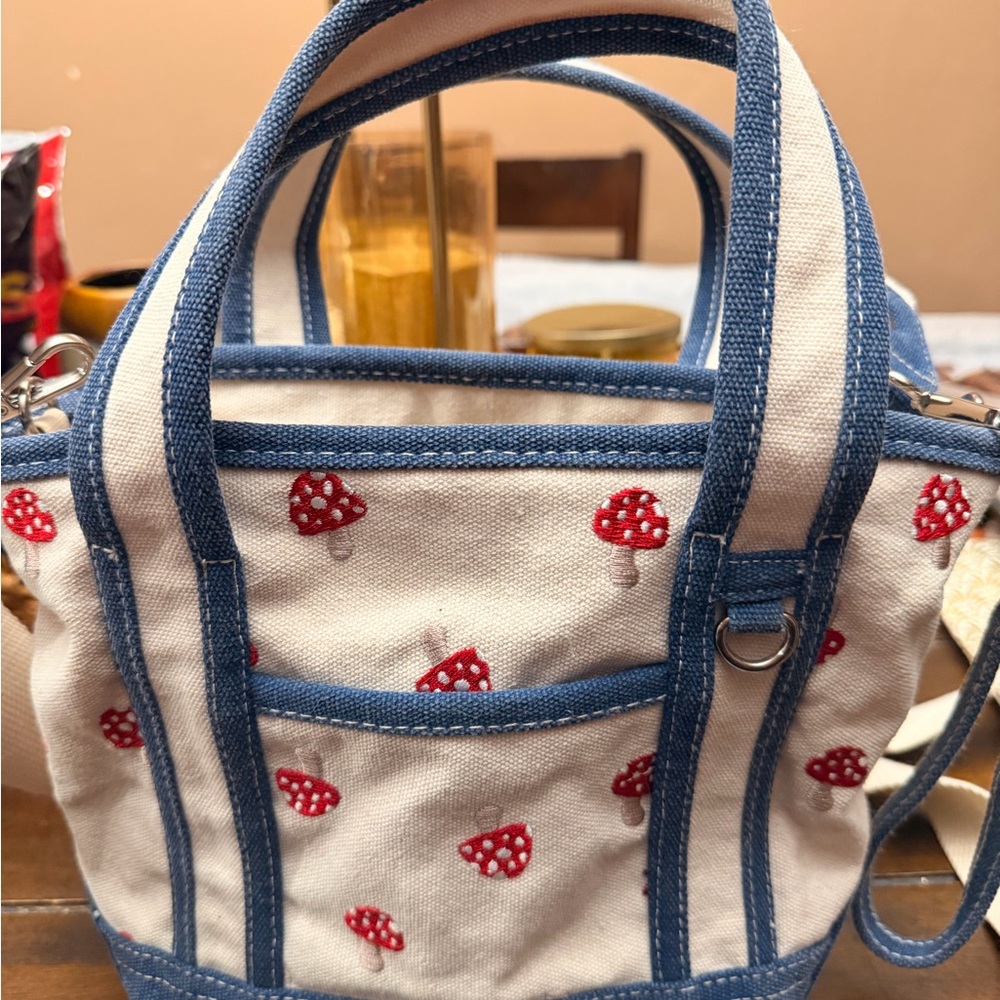Madden Girl Cream Canvas Crossbody with Red Mushroom Print & Blue Trim - Picture 2 of 5